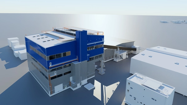 Foto: Aurubis: Mehrere Industrie Gebaeude an einer Straße und kleinen Türmen